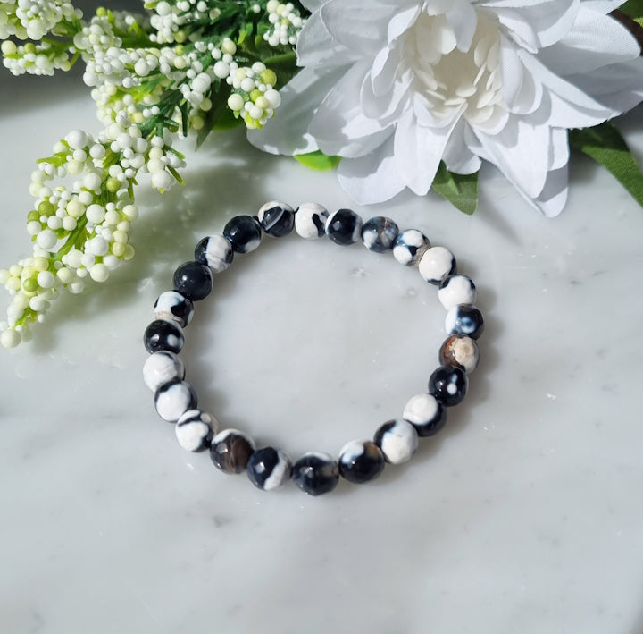 Armband Orca agat fasetterad, 8mm