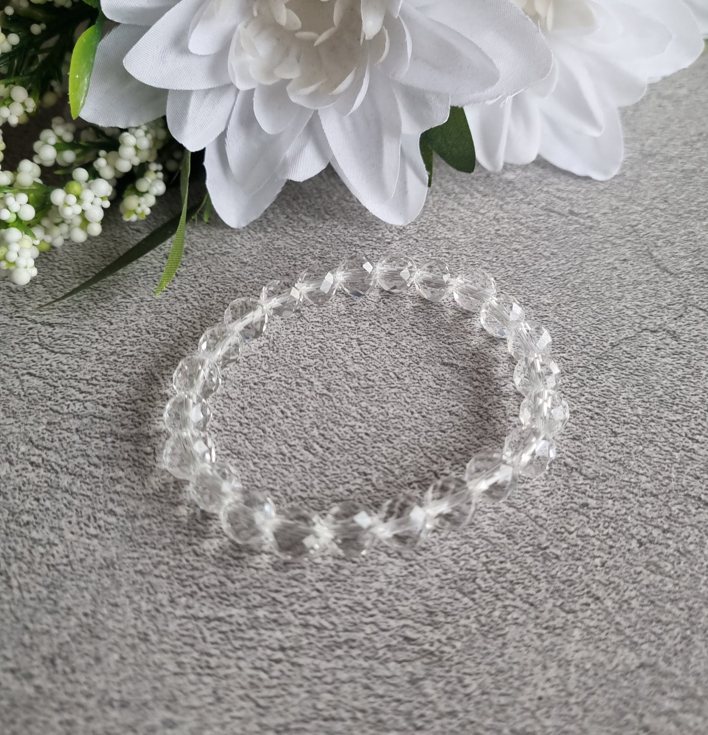 Armband Bergkristall fasetterad, 8mm